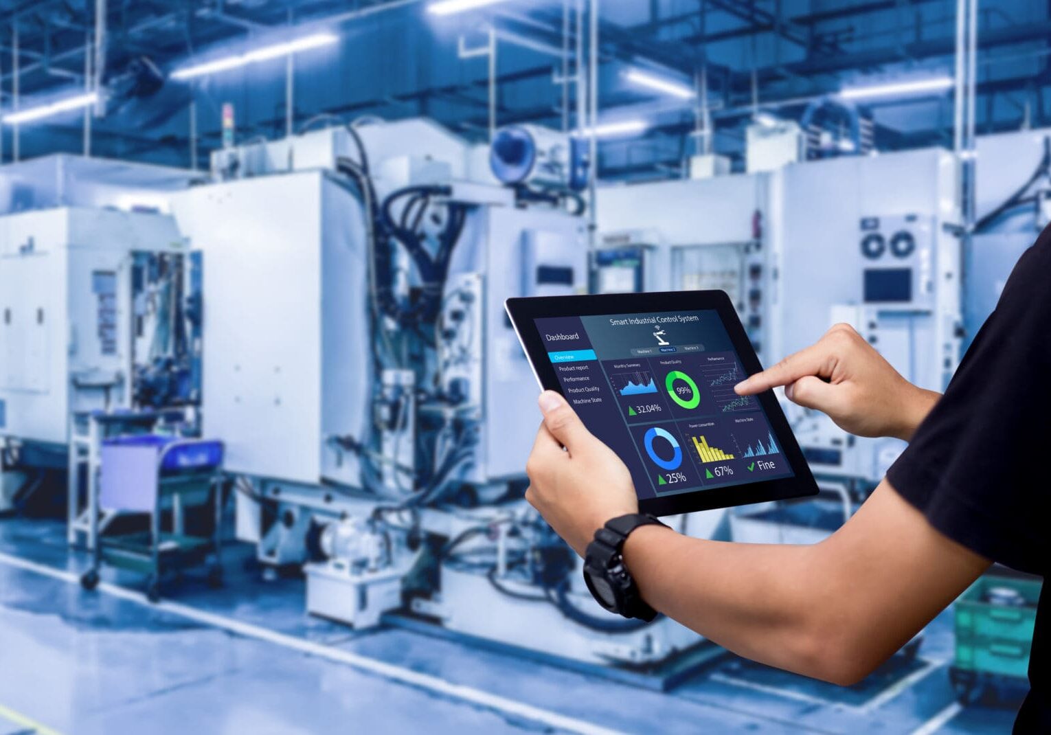 Smart industry control concept.Hands holding tablet on blurred automation machine as background